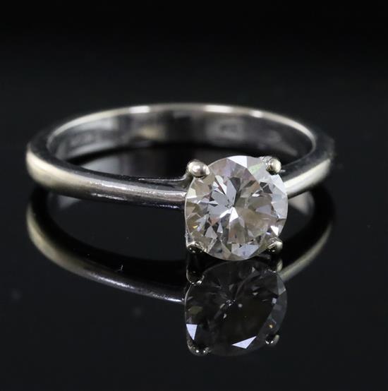 A modern 18ct white gold and solitaire diamond ring, size K.